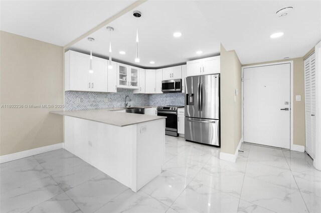 2851 NE 183rd St Unit 510E, Aventura, FL 33160 - kitchen featuring appliances with stainless steel finishes, light marble finish floors, baseboards, a sink, and recessed lighting