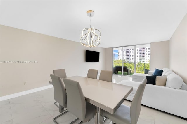 2851 NE 183rd St Unit 510E, Aventura, FL 33160 - dining space with light marble finish floors, a chandelier, baseboards, and a wall of windows