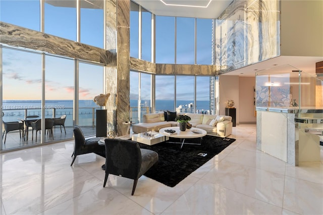 1300 Brickell Bay Dr Unit 4400, Miami, FL 33131 - living room featuring a high ceiling, a water view, and marble finish floors