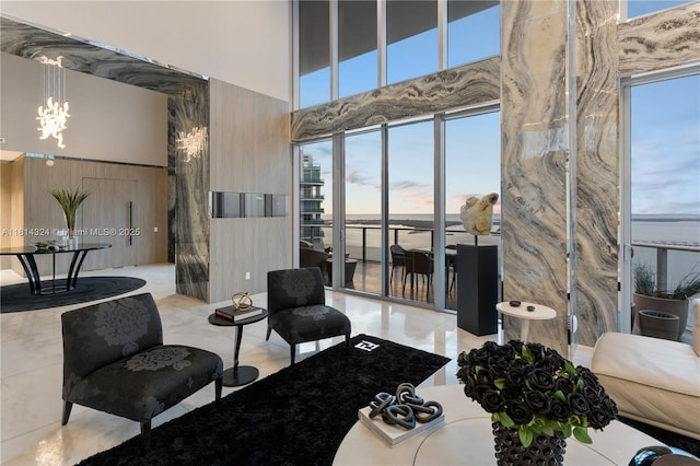 1300 Brickell Bay Dr Unit 4400, Miami, FL 33131 - living room featuring a high ceiling and a chandelier
