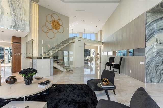 1300 Brickell Bay Dr Unit 4400, Miami, FL 33131 - common area with a towering ceiling and stairway