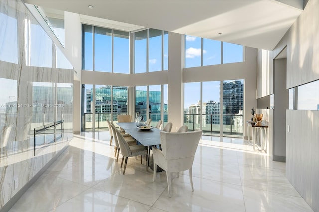 1300 Brickell Bay Dr Unit 4400, Miami, FL 33131 - dining area featuring a city view and a high ceiling