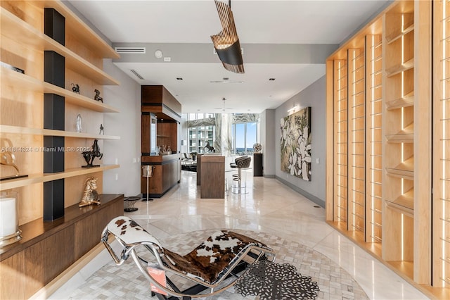 1300 Brickell Bay Dr Unit 4400, Miami, FL 33131 - hallway featuring light marble finish flooring