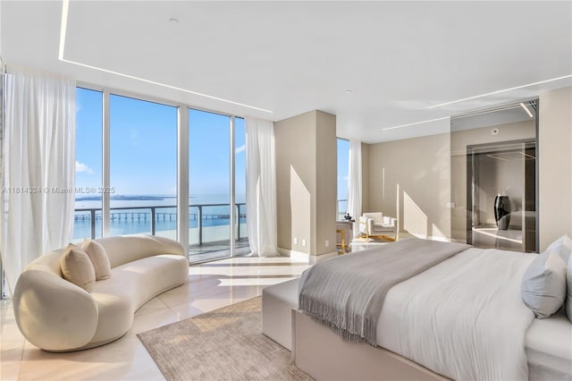 1300 Brickell Bay Dr Unit 4400, Miami, FL 33131 - bedroom featuring a wall of windows, a water view, access to outside, and tile patterned floors