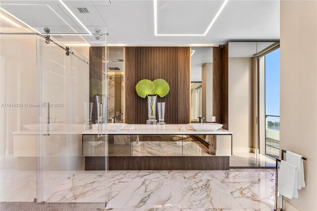 1300 Brickell Bay Dr Unit 4400, Miami, FL 33131 - bathroom with marble tiled flooring, double vanity, and a stall shower