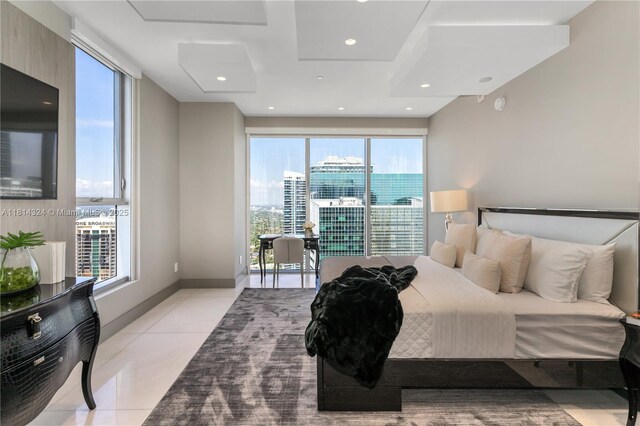 1300 Brickell Bay Dr Unit 4400, Miami, FL 33131 - bedroom featuring multiple windows, light tile patterned floors, and recessed lighting