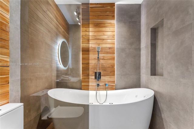 1300 Brickell Bay Dr Unit 4400, Miami, FL 33131 - bathroom with tile walls and toilet