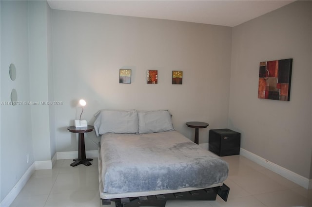 4001 S Ocean Dr Unit 11A, Hollywood, FL 33019 - bedroom featuring tile patterned floors and baseboards