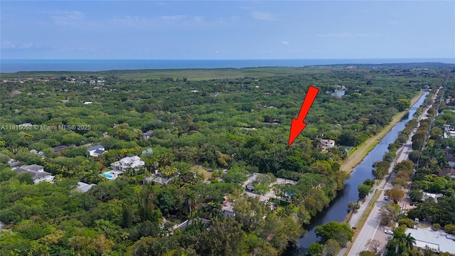 10005 Snapper Creek Rd, Coral Gables, FL 33156 - view of property location with a large body of water and a heavily wooded area