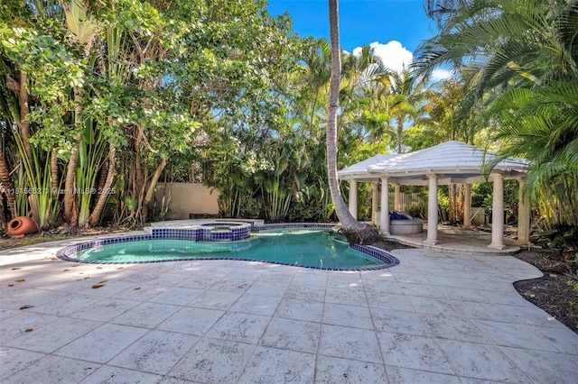 345 Harbor Ln, Key Biscayne, FL 33149 - view of swimming pool with a gazebo, a patio area, and a pool with connected hot tub