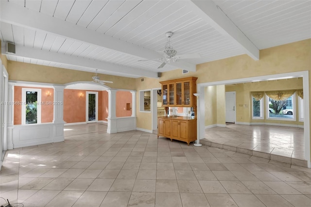345 Harbor Ln, Key Biscayne, FL 33149 - unfurnished living room featuring ornate columns, ceiling fan, beamed ceiling, a sink, and light tile patterned flooring