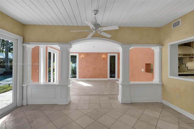 345 Harbor Ln, Key Biscayne, FL 33149 - unfurnished sunroom featuring arched walkways