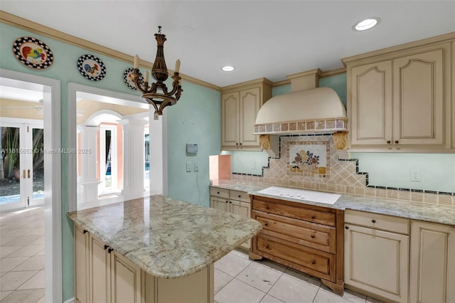 345 Harbor Ln, Key Biscayne, FL 33149 - kitchen featuring cream cabinets, light tile patterned flooring, white stovetop, and recessed lighting