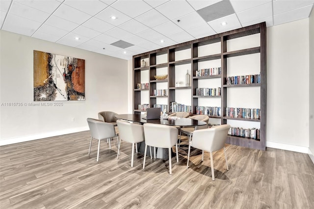 20505 E Country Club Dr Unit 138, Aventura, FL 33180 - dining space featuring wood finished floors, baseboards, a paneled ceiling, built in features, and recessed lighting