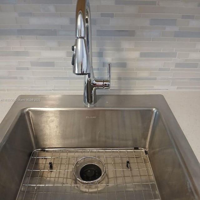 20505 E Country Club Dr Unit 138, Aventura, FL 33180 - kitchen view of a sink and decorative backsplash