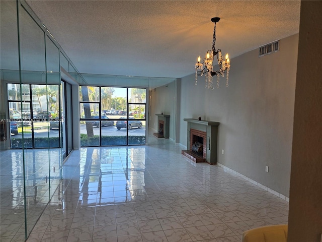 20505 E Country Club Dr Unit 138, Aventura, FL 33180 - unfurnished living room with a fireplace, a textured ceiling, a chandelier, light marble finish floors, and baseboards