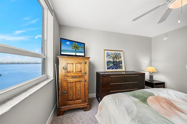 2000 N Bayshore Dr Unit 1011, Miami, FL 33137 - carpeted bedroom with baseboards and a ceiling fan