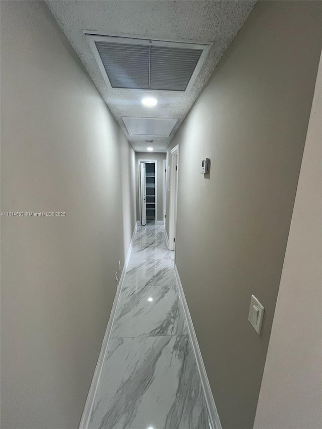 5416 Eagle Lake Dr Unit 4, Palm Beach Gardens, FL 33418 - hallway with light marble finish floors and attic access