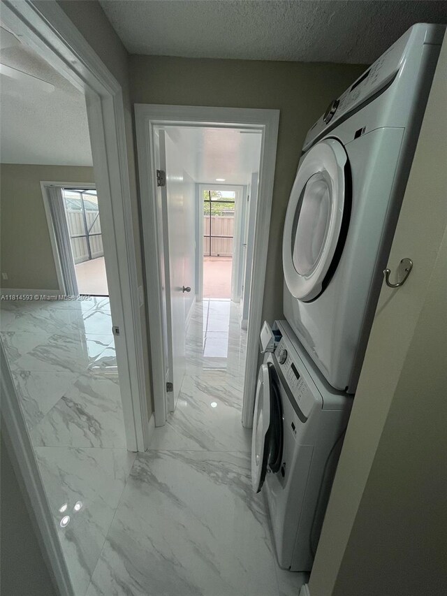 5416 Eagle Lake Dr Unit 4, Palm Beach Gardens, FL 33418 - unfurnished bedroom featuring marble finish floors and a closet