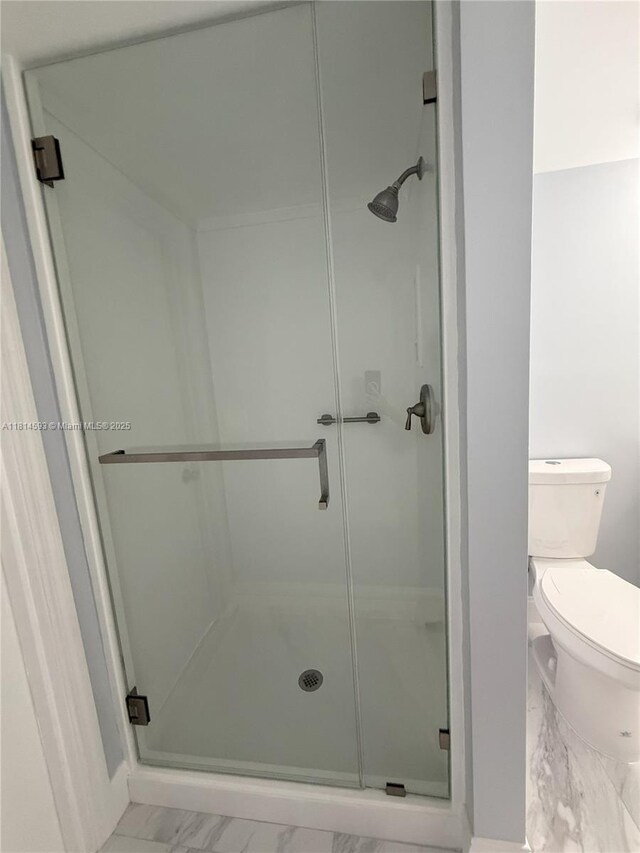 5416 Eagle Lake Dr Unit 4, Palm Beach Gardens, FL 33418 - washroom with light marble finish floors, stacked washer / dryer, and a textured ceiling