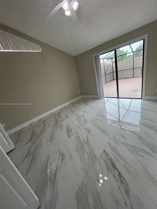5416 Eagle Lake Dr Unit 4, Palm Beach Gardens, FL 33418 - hall with light marble finish floors and baseboards