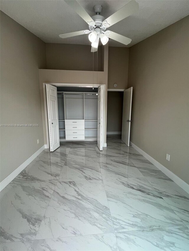 5416 Eagle Lake Dr Unit 4, Palm Beach Gardens, FL 33418 - bathroom featuring marble finish floors, vanity, and a textured ceiling