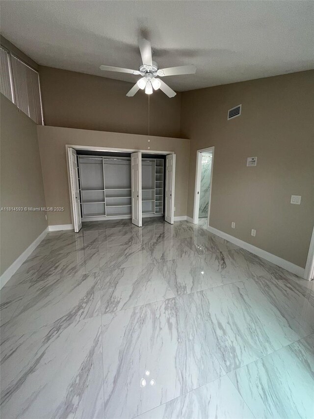5416 Eagle Lake Dr Unit 4, Palm Beach Gardens, FL 33418 - corridor featuring baseboards and light marble finish flooring