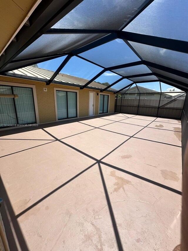 5416 Eagle Lake Dr Unit 4, Palm Beach Gardens, FL 33418 - view of patio with glass enclosure