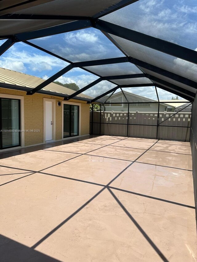 5416 Eagle Lake Dr Unit 4, Palm Beach Gardens, FL 33418 - view of patio / terrace featuring glass enclosure