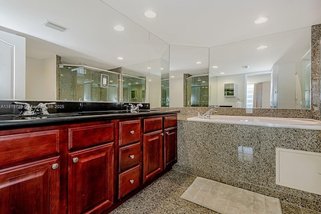 5600 Collins Ave Unit 10E, Miami Beach, FL 33140 - full bathroom with a shower stall, double vanity, a garden tub, and recessed lighting