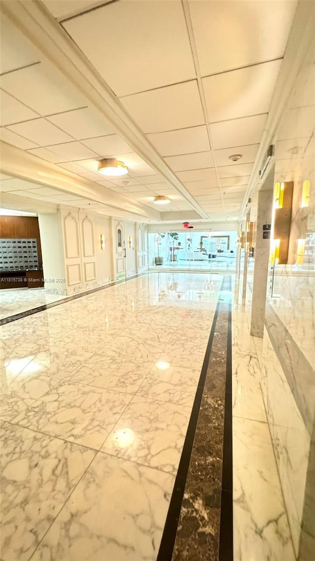 5600 Collins Ave Unit 10E, Miami Beach, FL 33140 - common area featuring a paneled ceiling