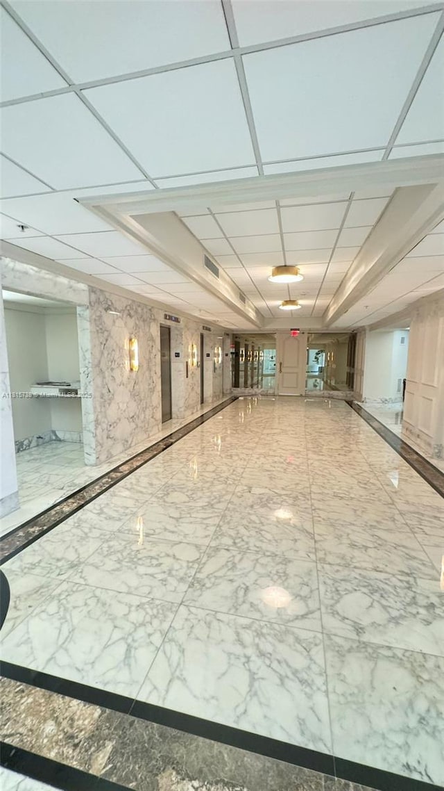 5600 Collins Ave Unit 10E, Miami Beach, FL 33140 - building lobby featuring a drop ceiling