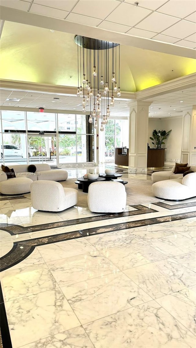 5600 Collins Ave Unit 10E, Miami Beach, FL 33140 - building lobby featuring a towering ceiling