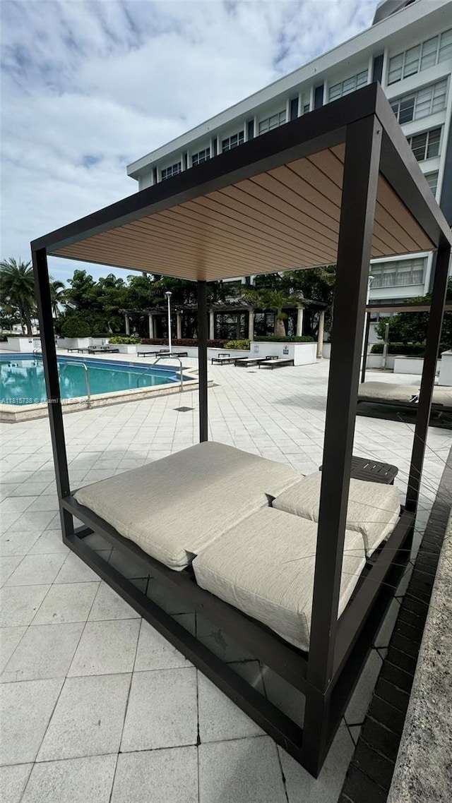 5600 Collins Ave Unit 10E, Miami Beach, FL 33140 - community pool featuring a patio