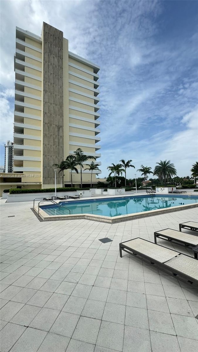 5600 Collins Ave Unit 10E, Miami Beach, FL 33140 - community pool with a patio area