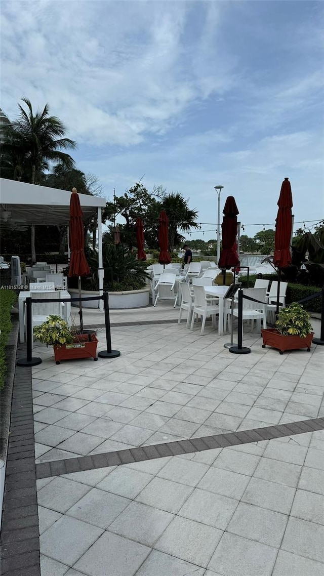 5600 Collins Ave Unit 10E, Miami Beach, FL 33140 - view of patio / terrace with outdoor dining space