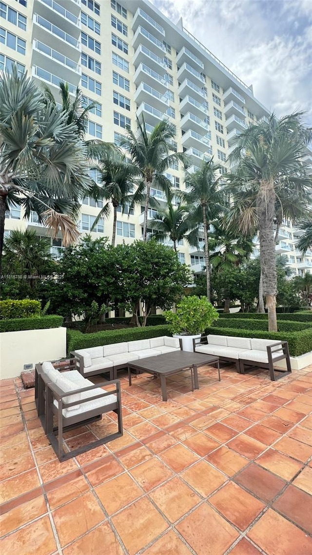 5600 Collins Ave Unit 10E, Miami Beach, FL 33140 - view of community with outdoor lounge area and a patio