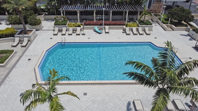 5600 Collins Ave Unit 10E, Miami Beach, FL 33140 - community pool featuring a patio area