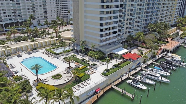 5600 Collins Ave Unit 10E, Miami Beach, FL 33140 - aerial view of a pool area, a nearby body of water, and apartment complex
