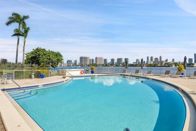 16570 NE 26th Ave Unit 6B, North Miami Beach, FL 33160 - community pool with a view of skyline and a patio area