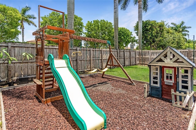 724 SE 37th Ave, Homestead, FL 33033 - view of play area with a fenced backyard