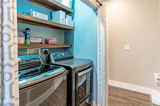 724 SE 37th Ave, Homestead, FL 33033 - washroom with washer and clothes dryer, wood finished floors, and baseboards