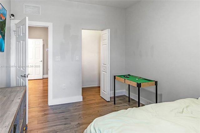 724 SE 37th Ave, Homestead, FL 33033 - bedroom featuring wood finished floors and baseboards