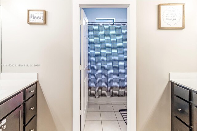724 SE 37th Ave, Homestead, FL 33033 - full bathroom featuring vanity, tile patterned flooring, and shower / bathtub combination with curtain