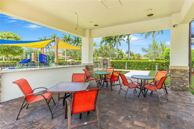 724 SE 37th Ave, Homestead, FL 33033 - view of patio featuring outdoor dining area