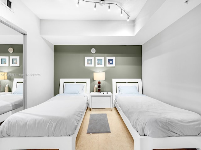 16699 Collins Ave Unit 2906, Sunny Isles Beach, FL 33160 - bedroom featuring rail lighting