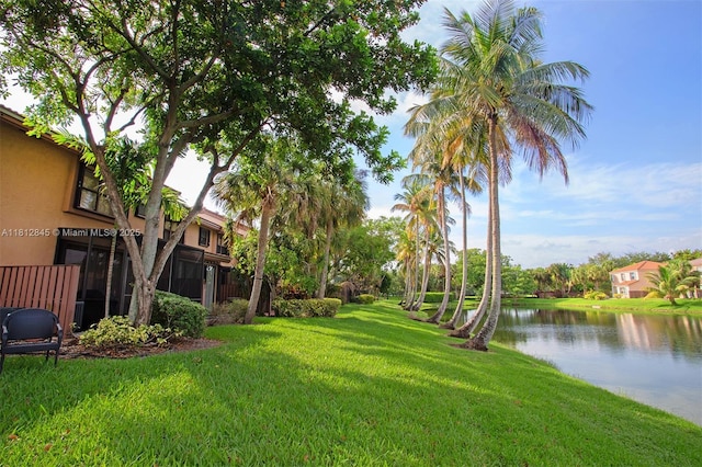 10630 NW 14th St Unit 115, Plantation, FL 33322 - view of grassy yard featuring a water view