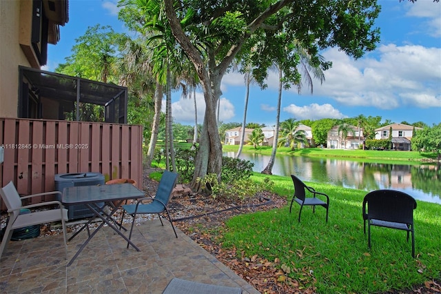 10630 NW 14th St Unit 115, Plantation, FL 33322 - view of patio with a water view, a residential view, and cooling unit