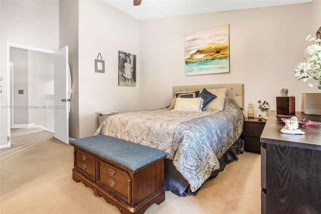 10630 NW 14th St Unit 115, Plantation, FL 33322 - bedroom featuring light colored carpet, baseboards, and a ceiling fan