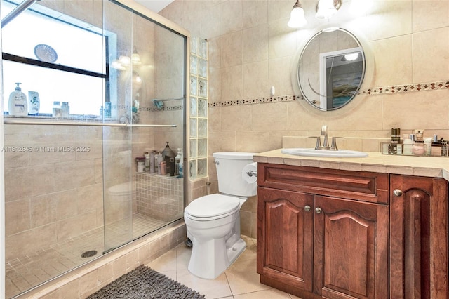 10630 NW 14th St Unit 115, Plantation, FL 33322 - full bath with tile walls, toilet, vanity, tile patterned floors, and a shower stall